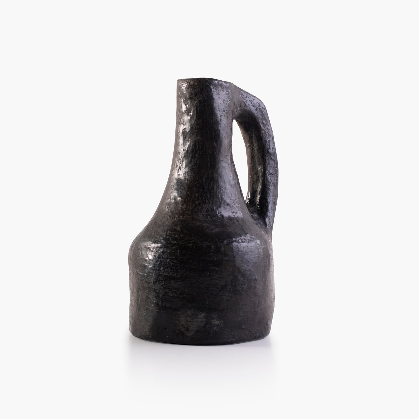 Large, black terracotta vase with handle