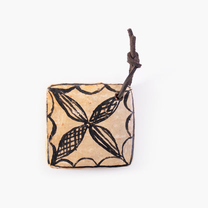 Nude terracotta coasters with black details