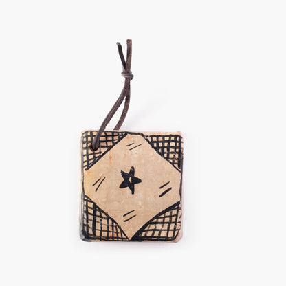 Nude terracotta coasters with black details